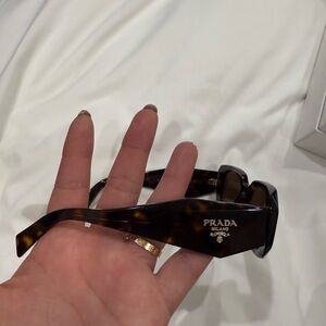 Prada Luxottica Label in Black and White